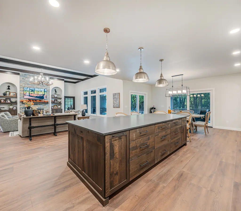 Open concept kitchen and living space in a custom home.